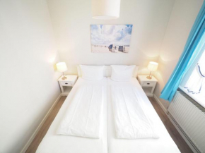Im-Zentrum-von-Westerland-Neptun-App-1-mit-offenem-Wohn-und-Kochbereich